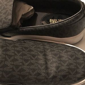 MK slip on shoes black logo size 9